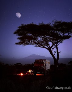 The quintessential camping photo, resembling beauty, freedom, romance, and peace. It is taken by my photographer friend Michael Boyny on their 1.5 year camper trip in Africa with Mathilda as he and his wife Sabine called their truck. That's Kilimajaro in the background.