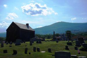 Mount Greylock behind a cemetery in the town of Adams